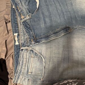 Risen 3X Adorable asymmetrical waist. Cropped length with raw hem.